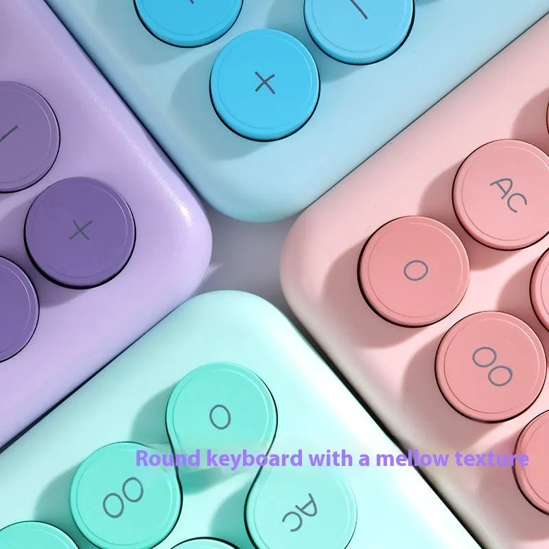 Dopamine gradient colour desk calculator in violet, cherry blossom powder, glacier blue, and mint green variants.