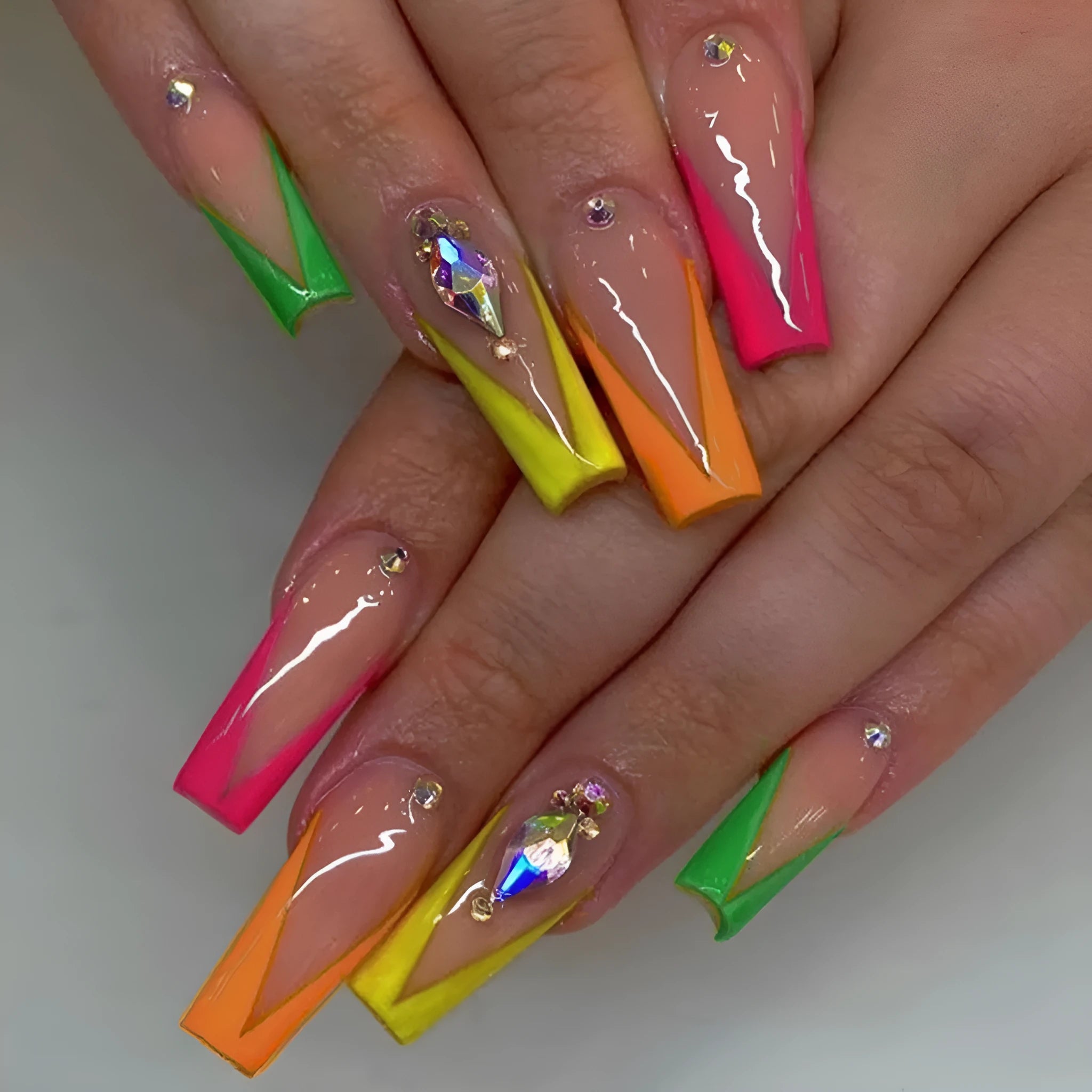 Diamond colour press-on nail tips with cartoon, love, and cross heart designs for a French manicure look.