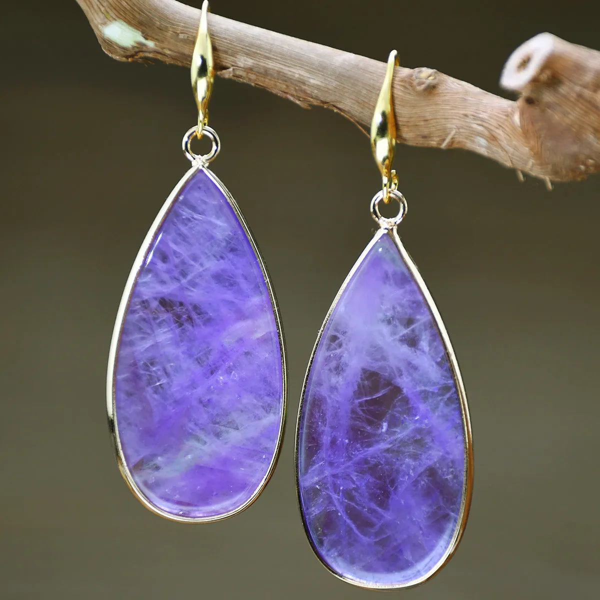 Vintage tigereye stone drop earrings with elongated water drop shape and textured elements