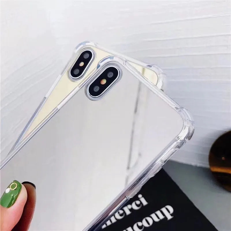 Mirrored back protective TPU case for iPhone on a table