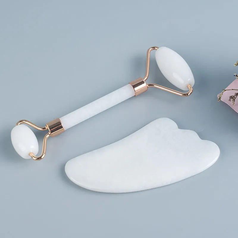 White jade facial roller and gua sha board set for skincare massage