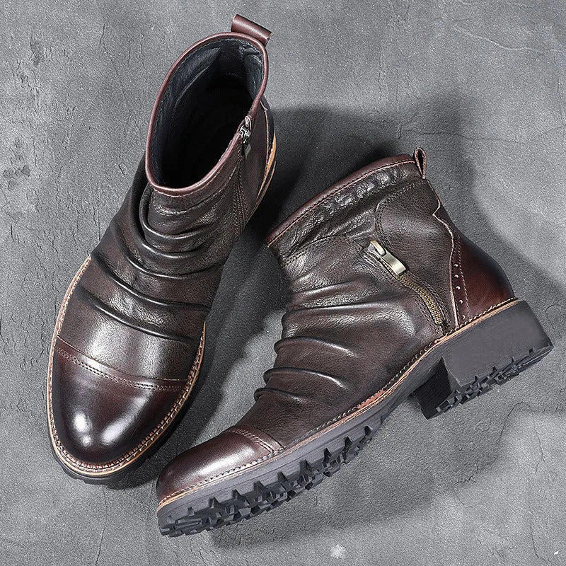 Men's black side-zip cowboy boots with a mid-calf shaft and horseshoe heel on a plain background