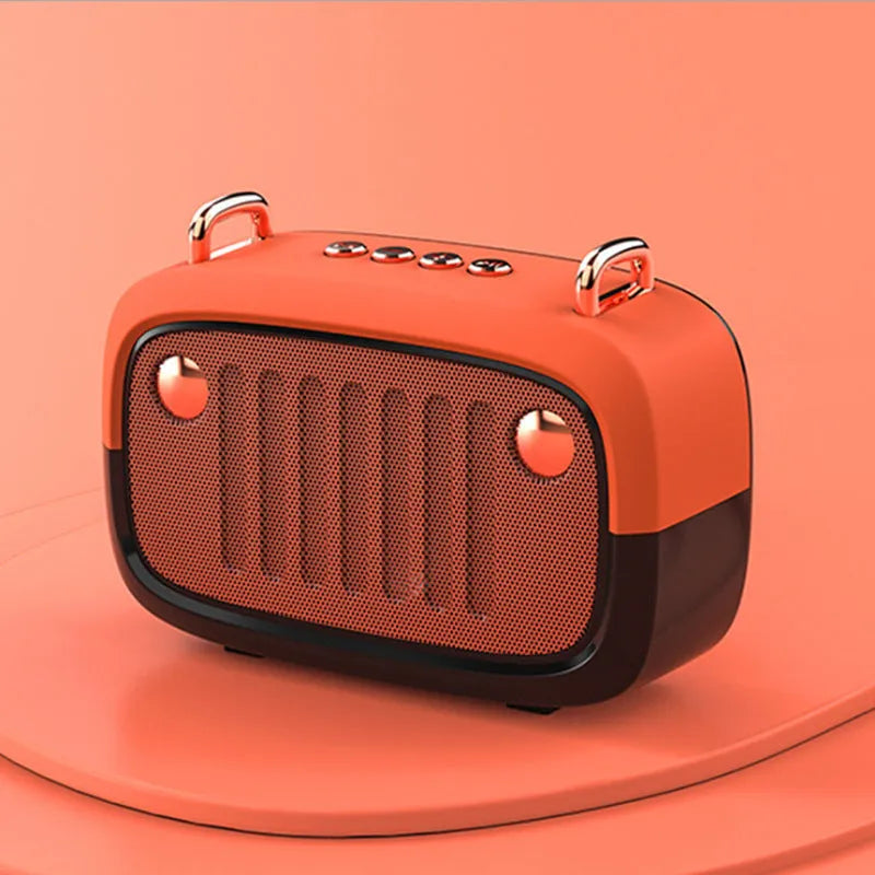 Small black portable Bluetooth speaker with USB port on a plastic and ABS cabinet.
