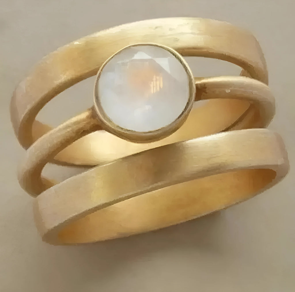 Gold-plated titanium steel ring with white chalcedony micro-inlay in geometric design