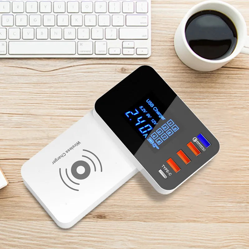 White multi USB port fast charger with wireless charging pad on top, showing four USB ports and UK plug adapter