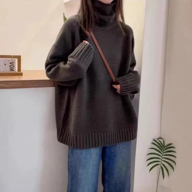 Women's loose red turtleneck sweater with thick curling pile collar, casual style.