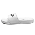 Men's open-toe slippers with rubber sole available in black and white colours for larger foot sizes