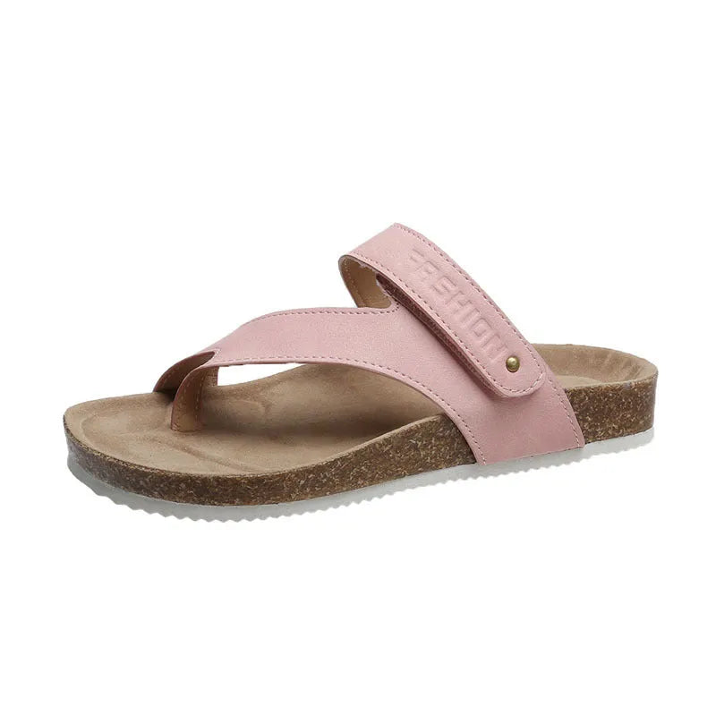 Women's flat toe ring flip-flop in a solid colour with a thick foam sole.