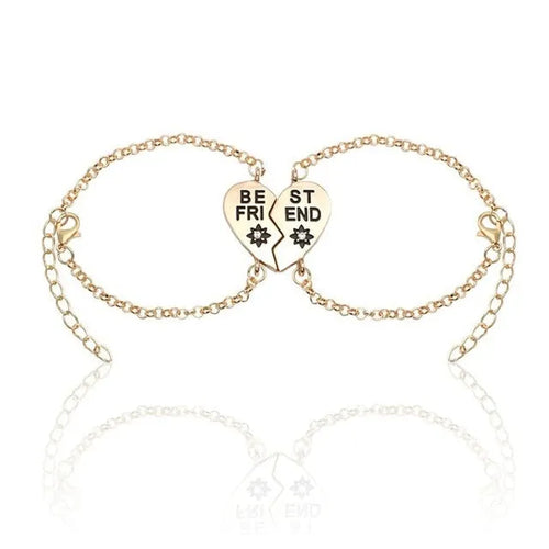 Heart shape alloy bracelet with dripping oil finish and inlaid gems in gold and silver colours