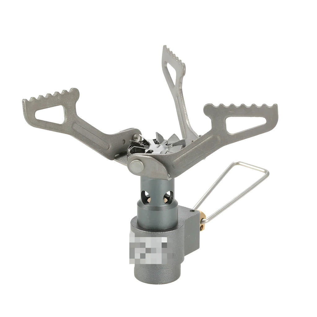 A portable single-burner propane camping stove with a one-piece metal furnace, shown outdoors.