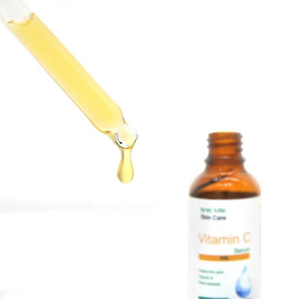 30ml bottle of vitamin C serum essence for facial brightening and antioxidant treatment