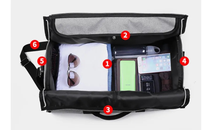 Medium sized cylindrical duffle travel bag in black, shown with zipper open, made from Oxford cloth.