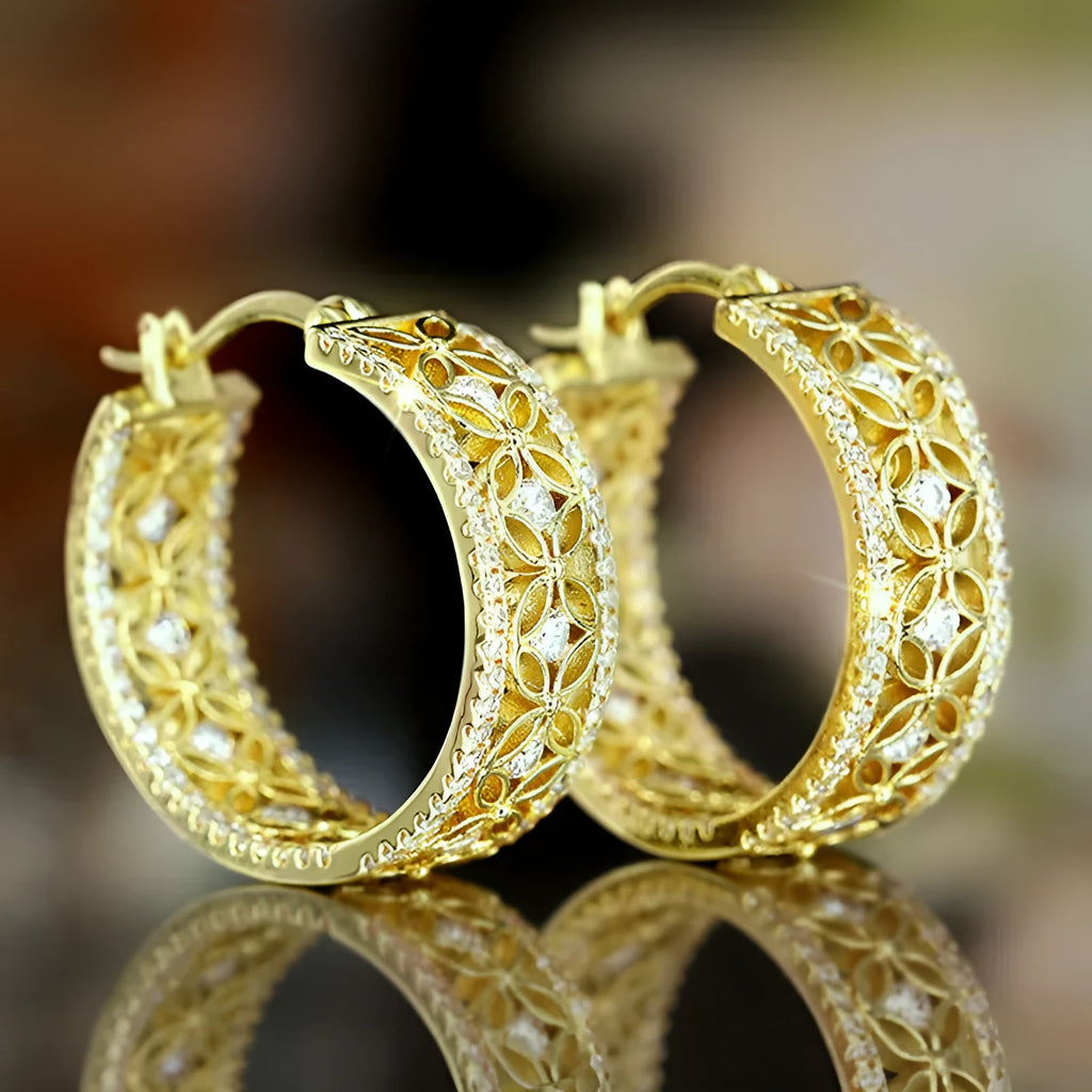 Geometric copper clip earrings with horse eye flower butterfly design in yellow gold colour