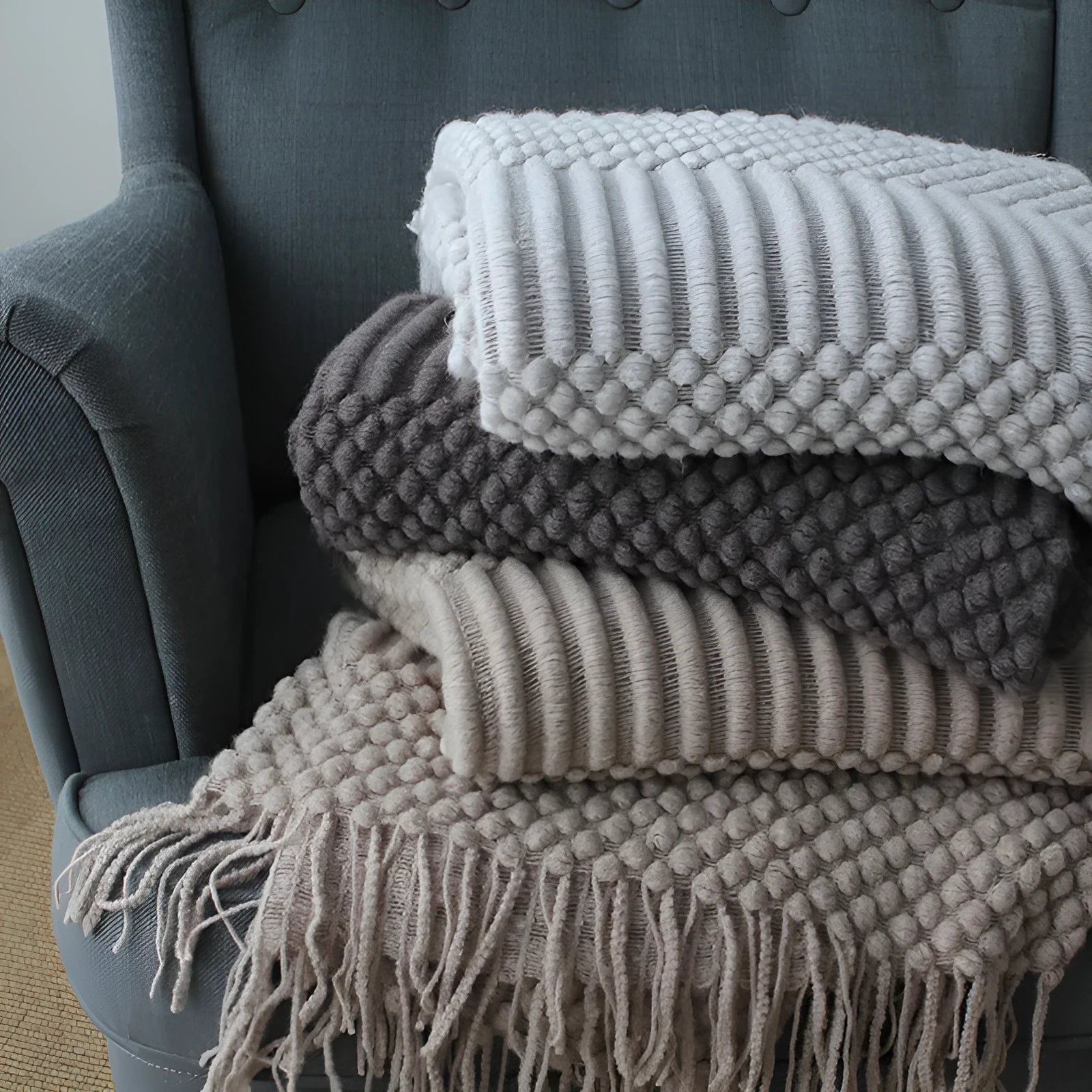 Small polyester nap blanket in dark grey, khaki, or light grey, dimensions 127cm by 170cm