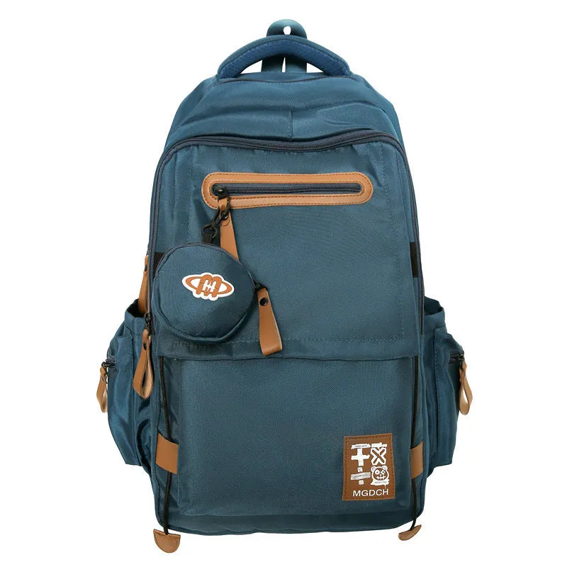 Large nylon backpack for middle school students with curved shoulder straps in solid colour options