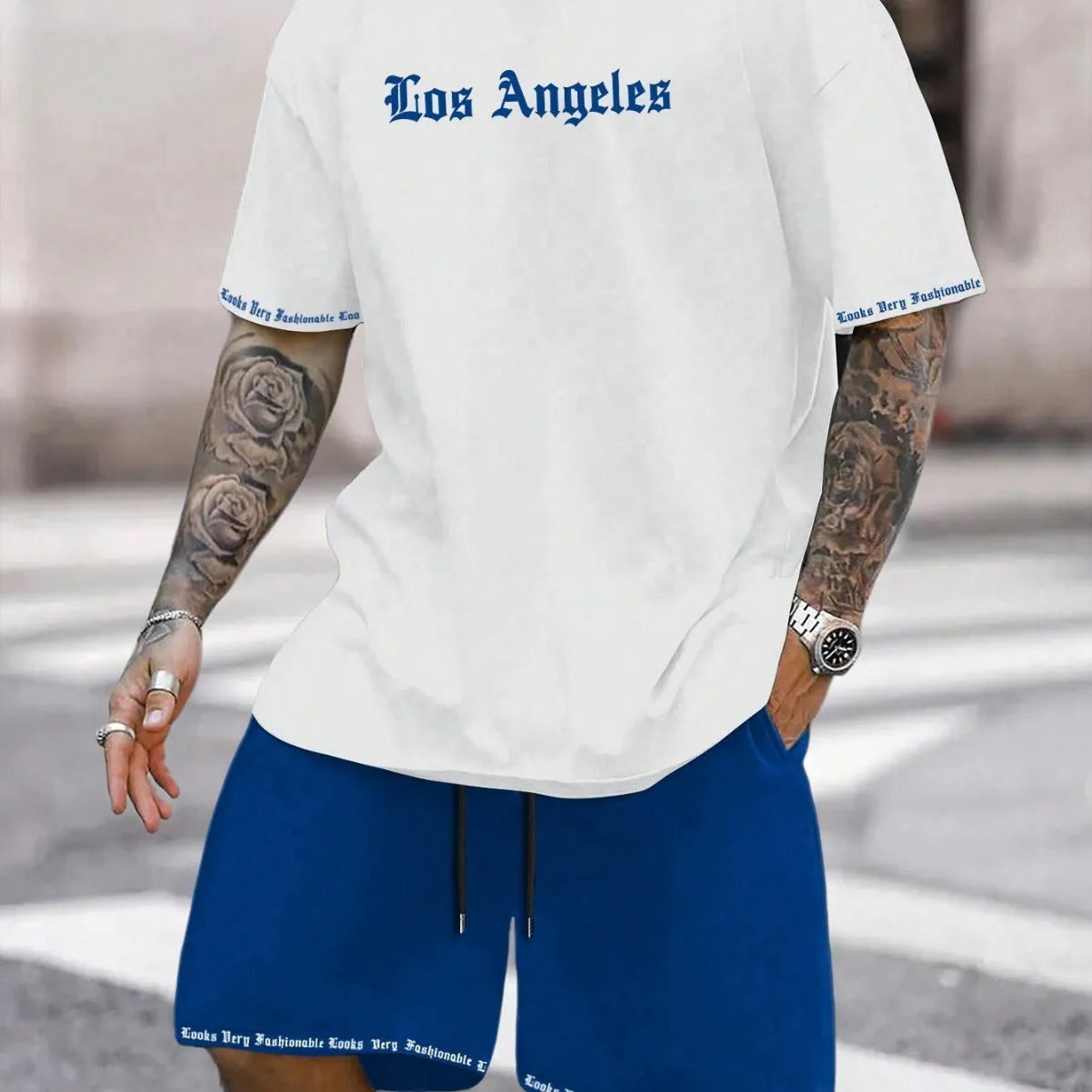 Sports style short-sleeved shorts set with printed pattern, loose fit shorts, and quick-dry fabric