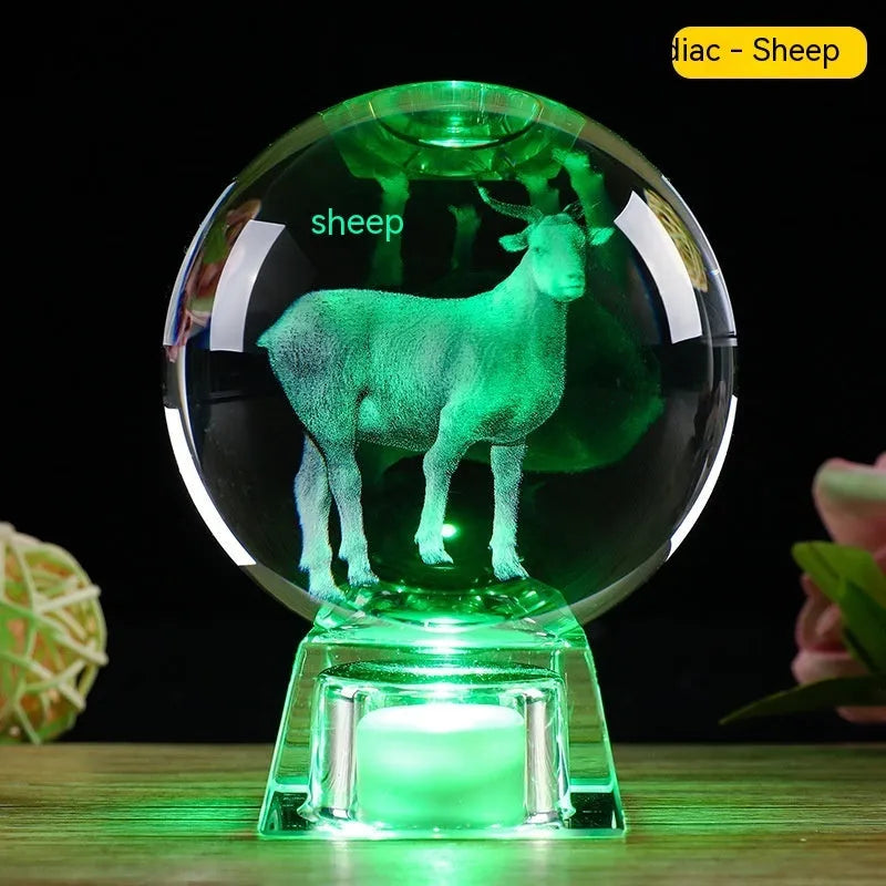 White crystal ball zodiac ornament with luminous electronic base showing Chinese zodiac animal design
