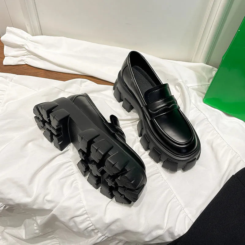British style wide fit loafers for men and women in either matte or glossy patent leather.