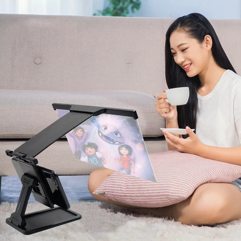 Black L20 smartphone screen magnifier with separate mounting bracket on a table.