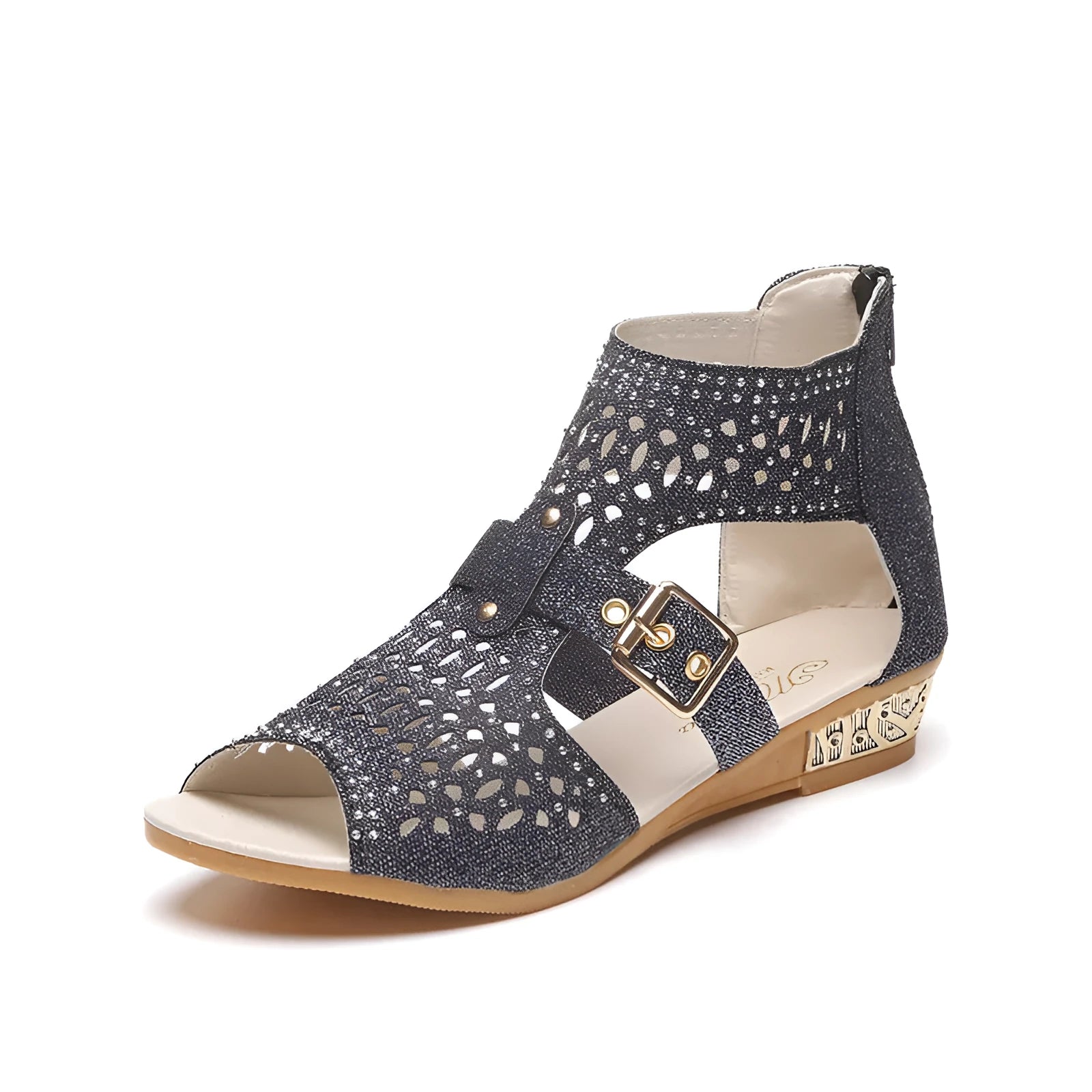 Women's beige flat sandals with wedge heel, rivet detail, and back zipper.