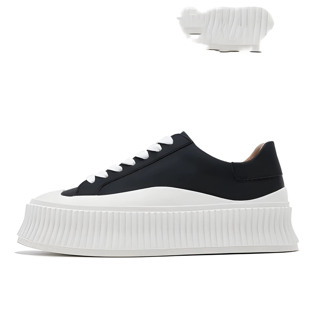 Women's black platform sneakers with back lacing and thick rubber sole