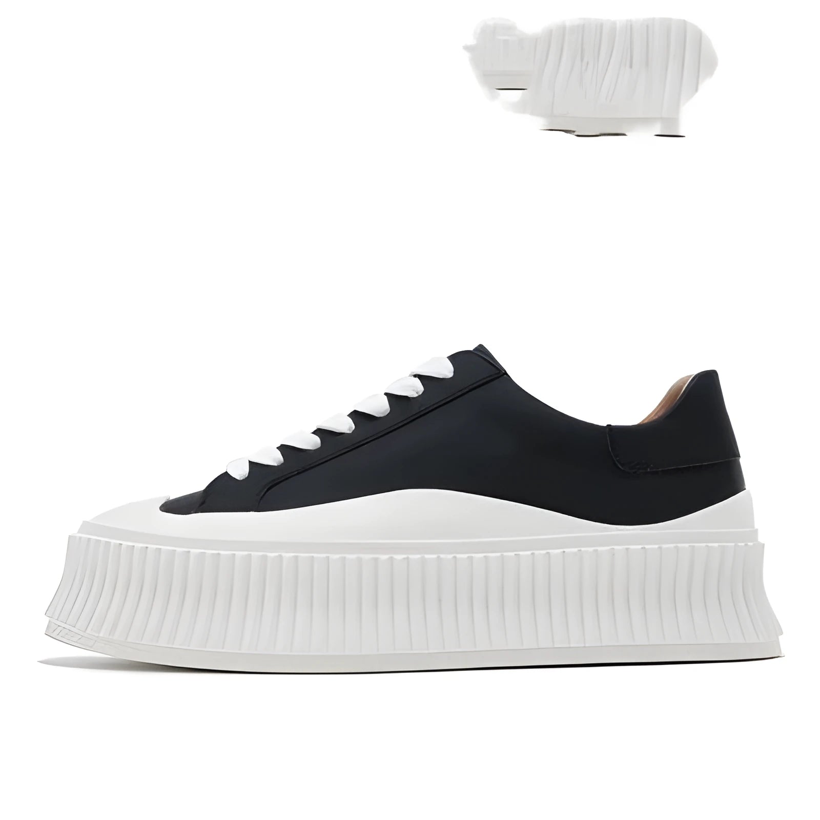 Women's black platform sneakers with back lacing and thick rubber sole