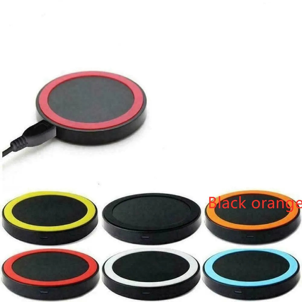 Square Qi wireless charging base for mobile phones in one of six colours on a desk.