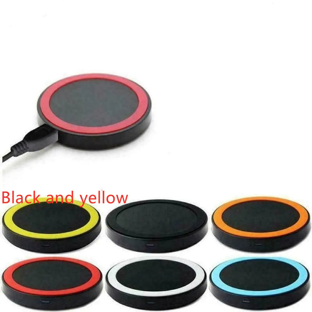 Square Qi wireless charging base for mobile phones in one of six colours on a desk.
