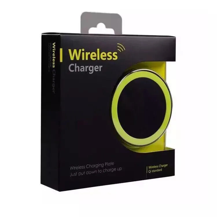 Square Qi wireless charging base for mobile phones in one of six colours on a desk.