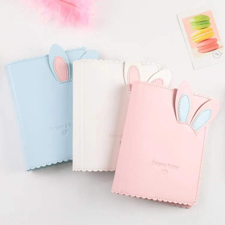 Cute bunny mini photo album in pink, blue, or white with 16 pages for 3-inch photographs