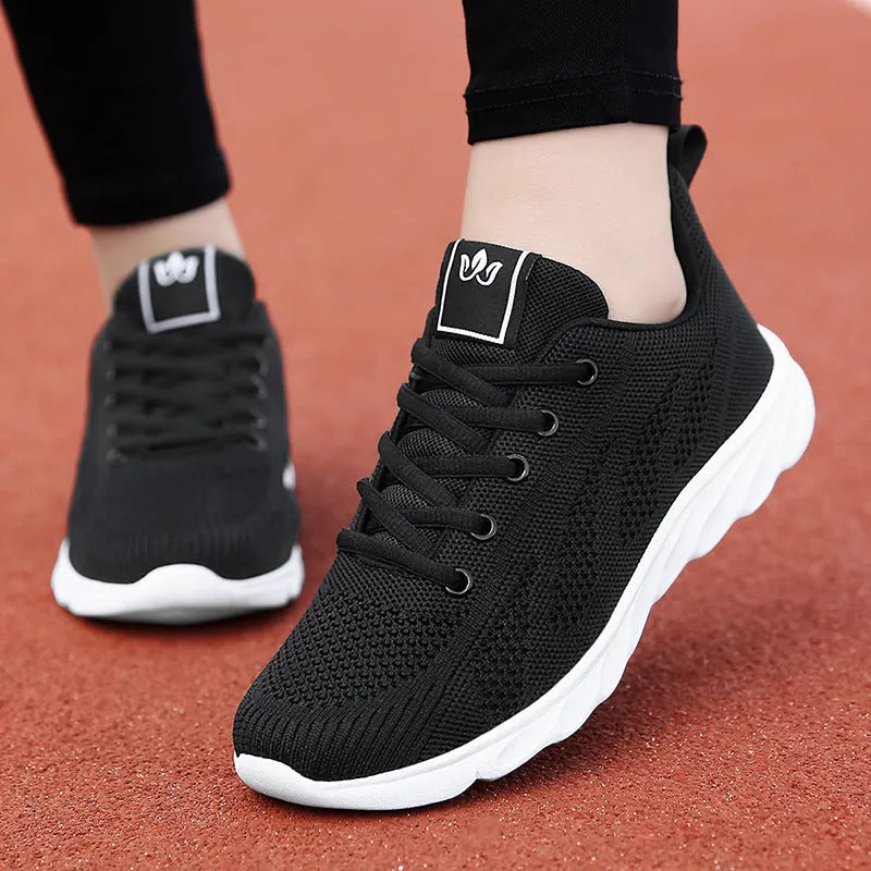 Women's high-top casual trainers in black with back lacing and cross bind straps