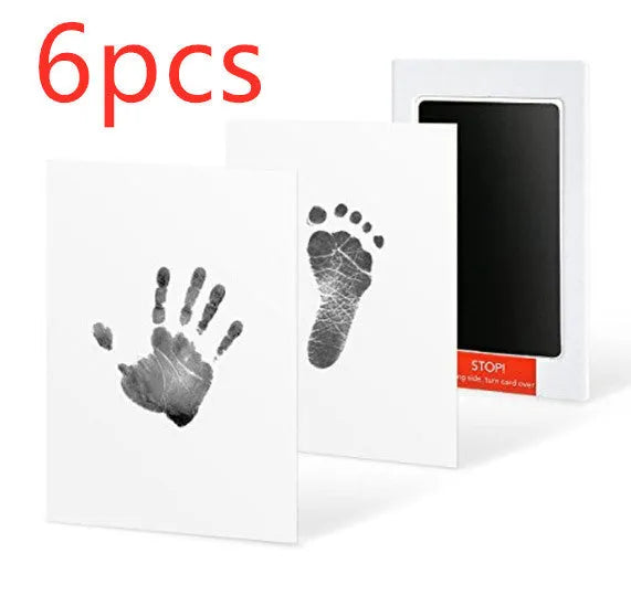 Baby hand and foot printing kit with anti-cross infection disposable pad and photo frame
