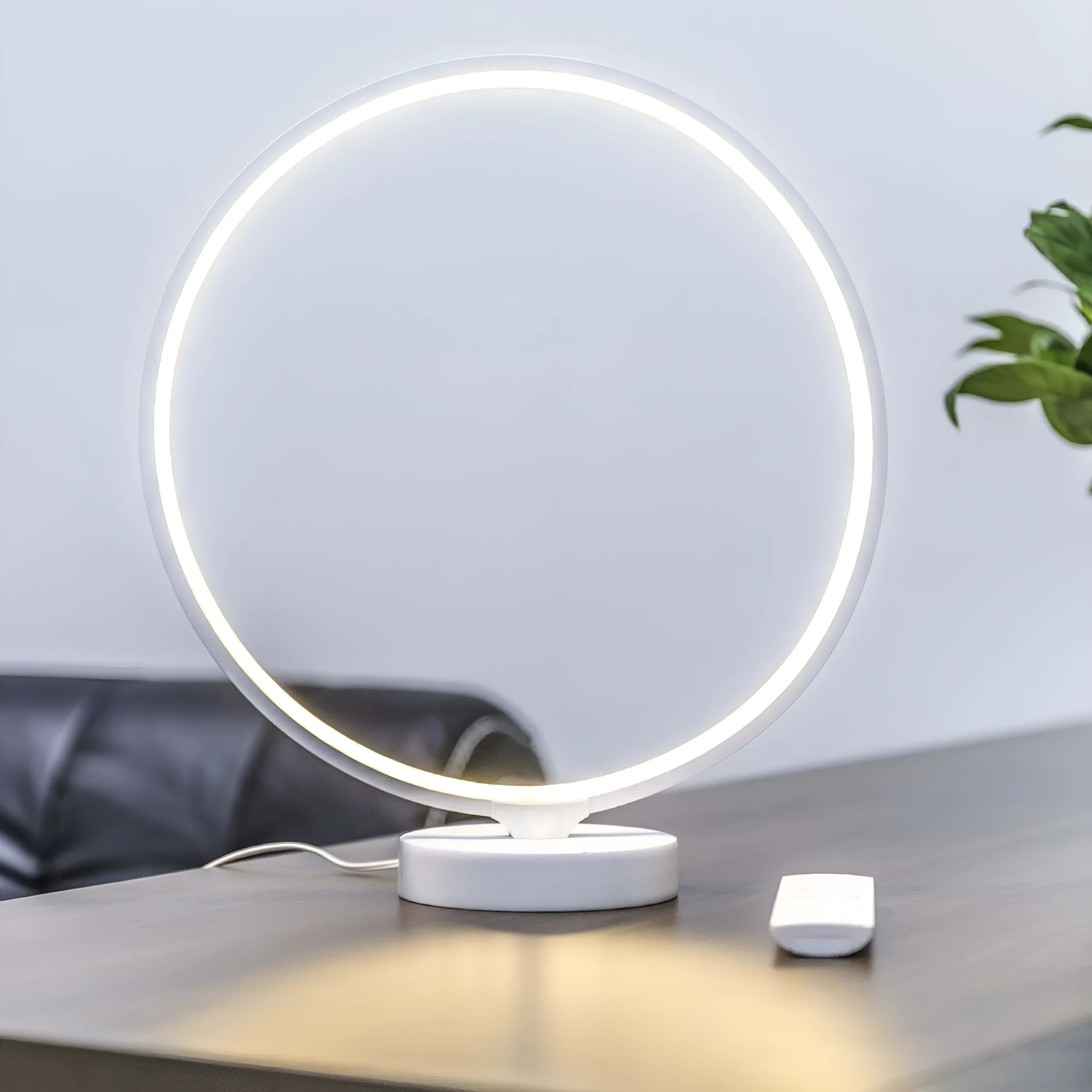 30 cm white full moon lamp with remote control on table surface showing detailed moon texture