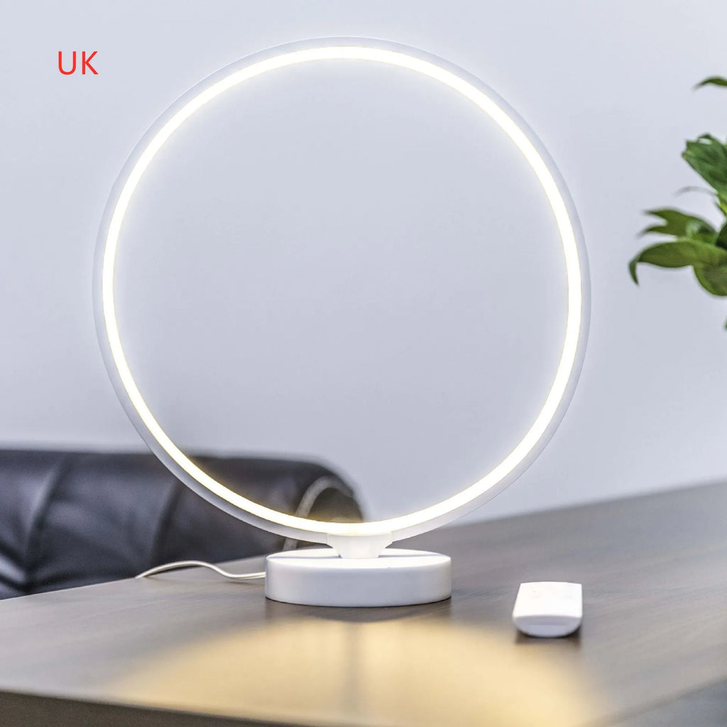 30 cm white full moon lamp with remote control on table surface showing detailed moon texture