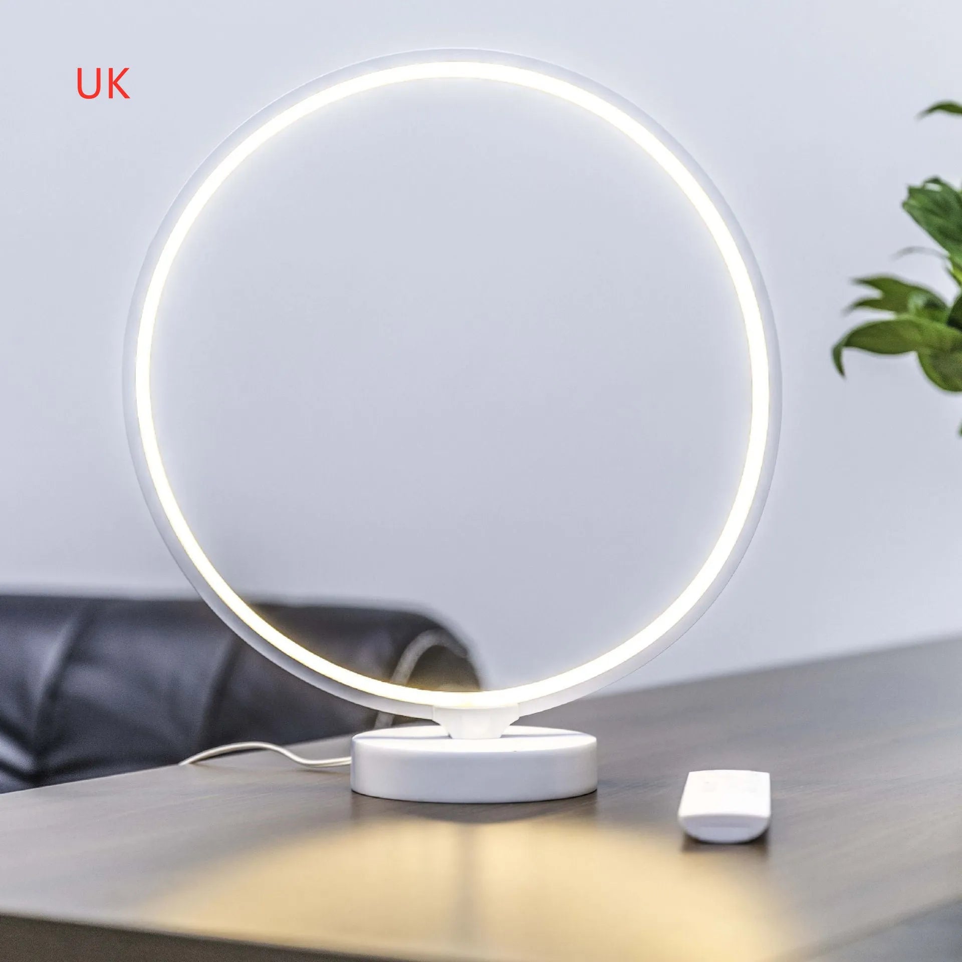 30 cm white full moon lamp with remote control on table surface showing detailed moon texture