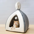 Grey cloth cat house with removable cushion showing interior space