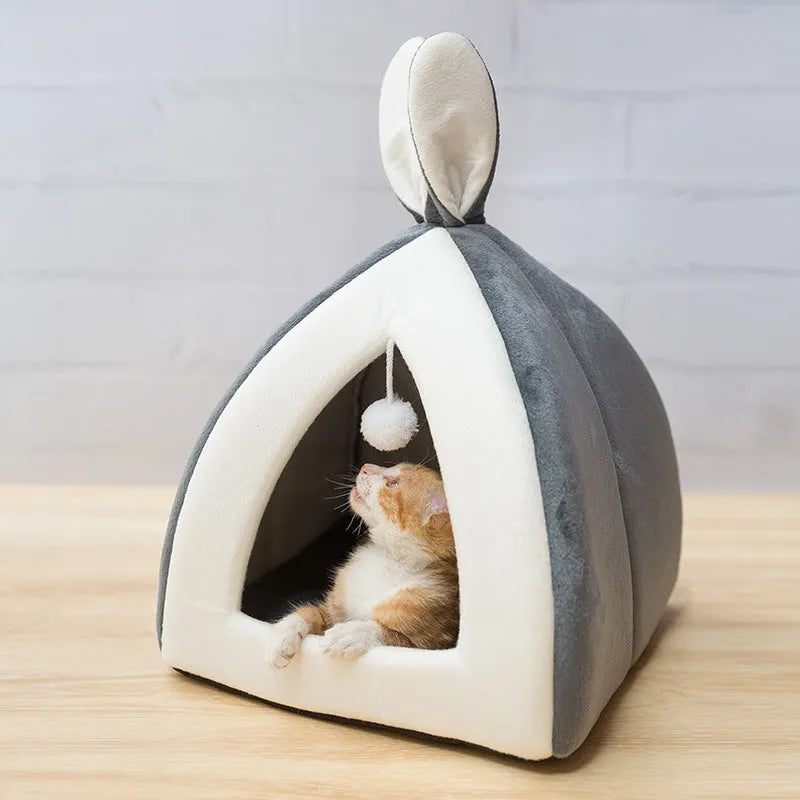 Grey cloth cat house with removable cushion showing interior space