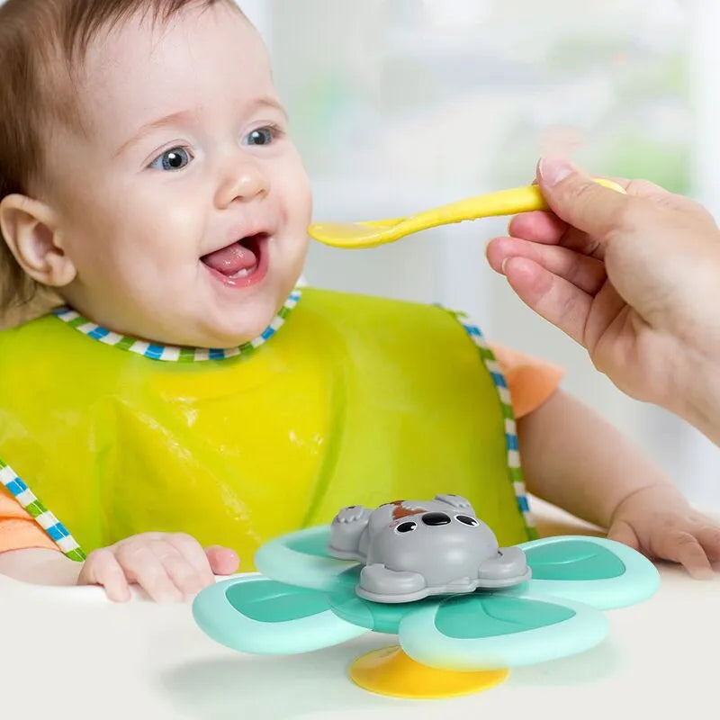 Infant spinning top sucker toy set of 3 pieces in plastic for bath and feeding play