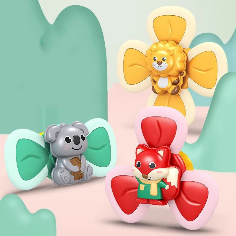 Infant spinning top sucker toy set of 3 pieces in plastic for bath and feeding play