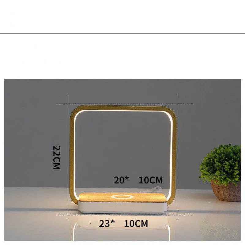 Modern bedside lamp with aluminium shade featuring touch sensor and voice control, available in white or gold colours