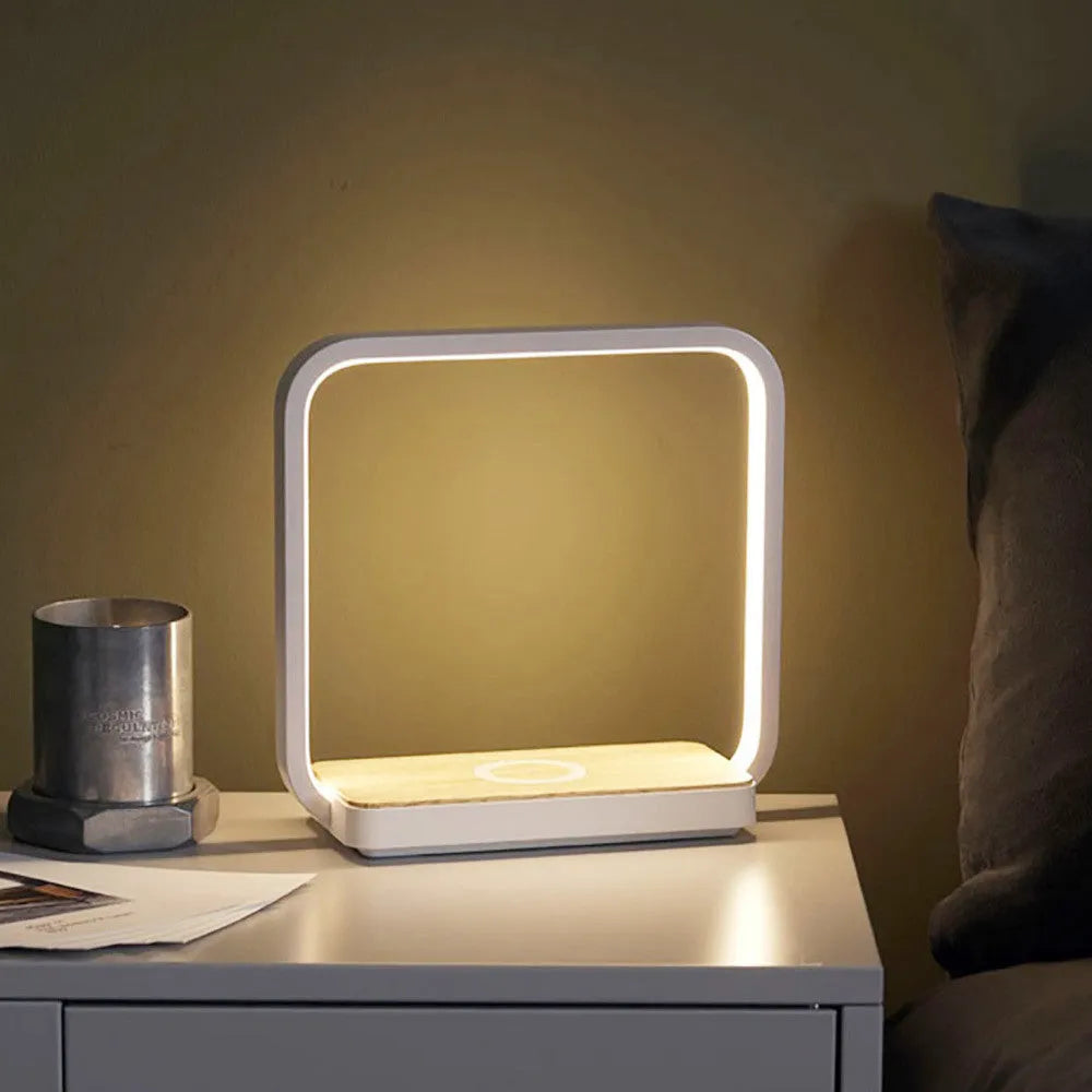 Modern bedside lamp with aluminium shade featuring touch sensor and voice control, available in white or gold colours