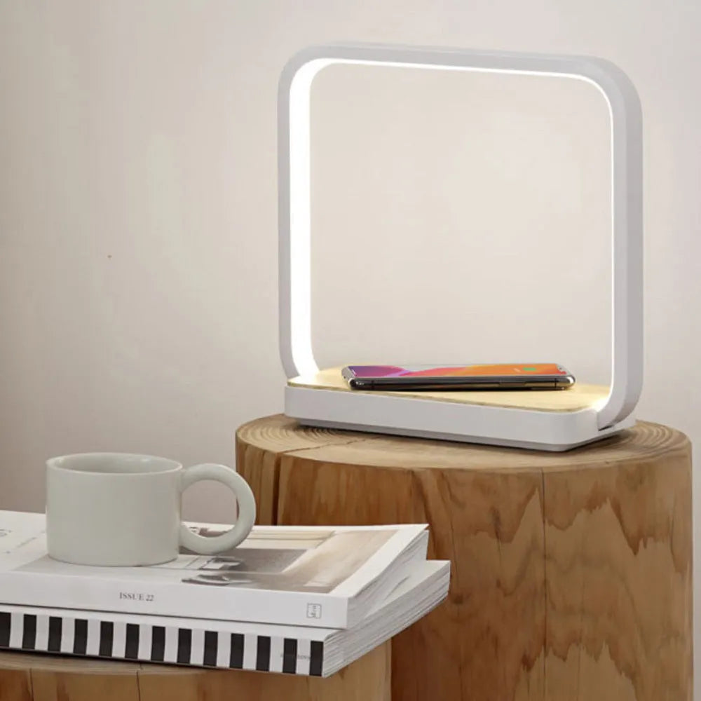 Modern bedside lamp with aluminium shade featuring touch sensor and voice control, available in white or gold colours