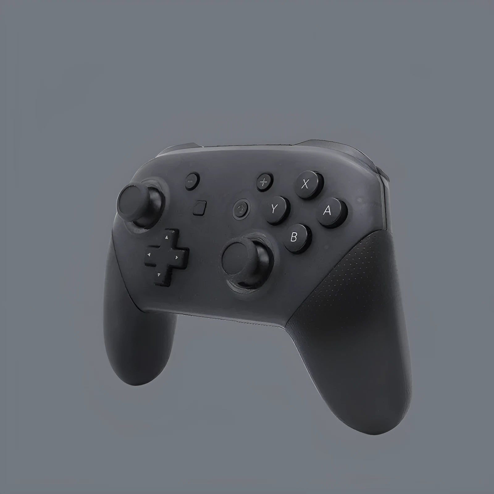 Black Switch PRO wireless Bluetooth gamepad controller for Nintendo Switch on a dark surface.