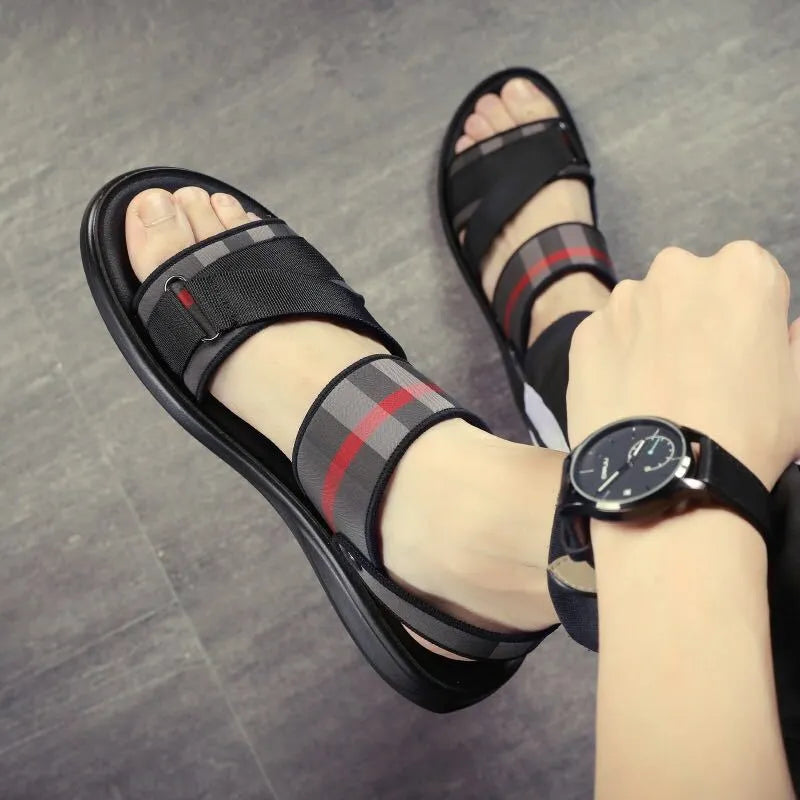 Youth leisure sports sandals with a Lycra fabric upper and polyurethane sole on a white background.
