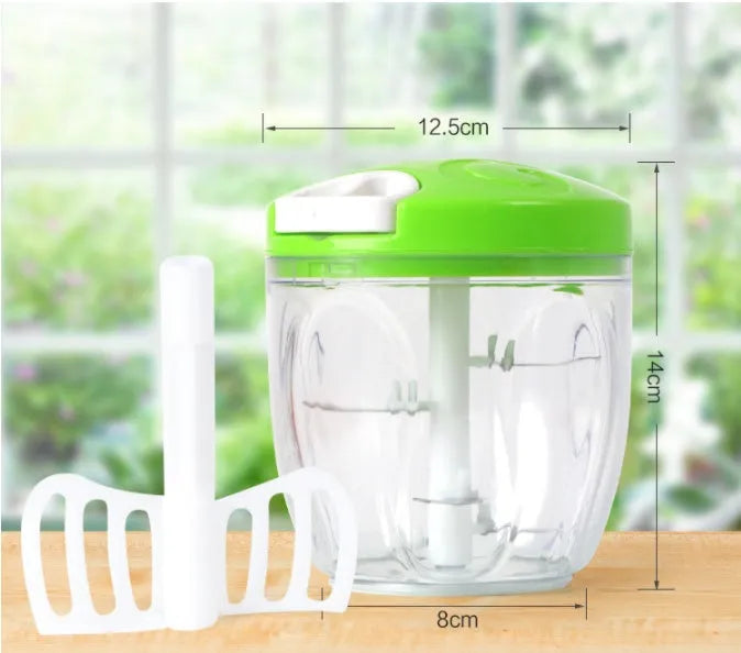 Green manual kitchen chopper with three blades showing 500ml capacity container functionality