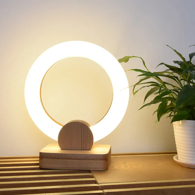Wooden circular Nordic style LED chandelier with a round acrylic lampshade, shown in two diameter options.