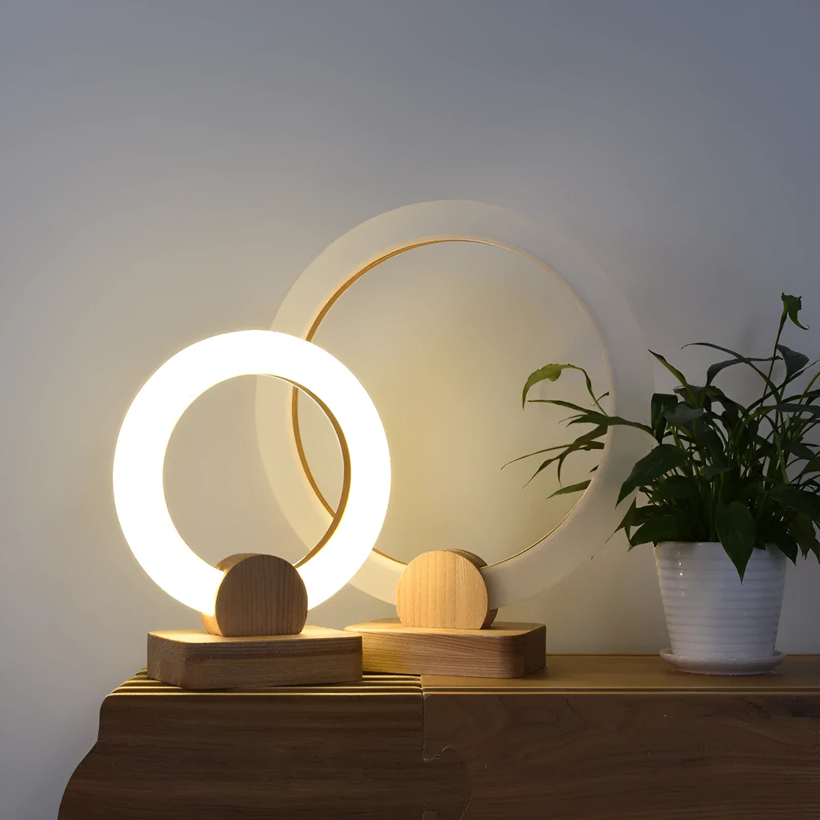 Wooden circular Nordic style LED chandelier with a round acrylic lampshade, shown in two diameter options.