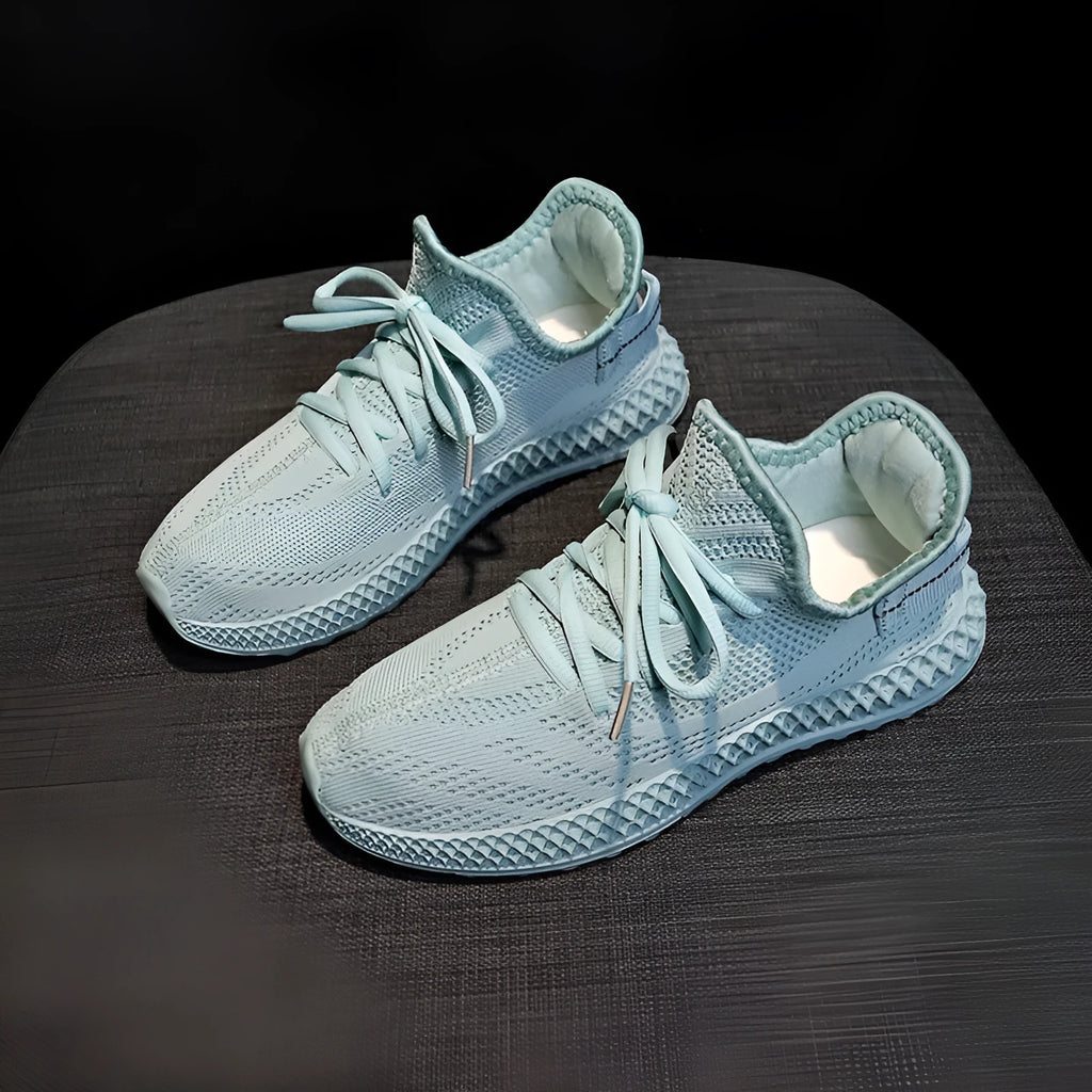 Women's breathable mesh sneakers in yellow with white rubber sole and lace-up fastening