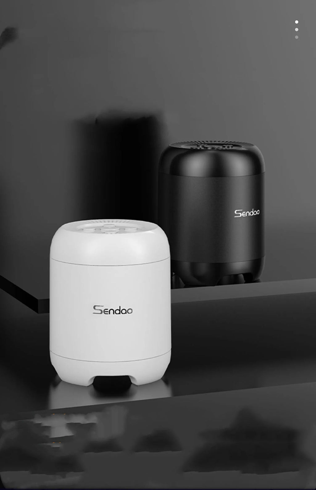 Compact black and white Bluetooth wireless speaker with super subwoofer showing USB port