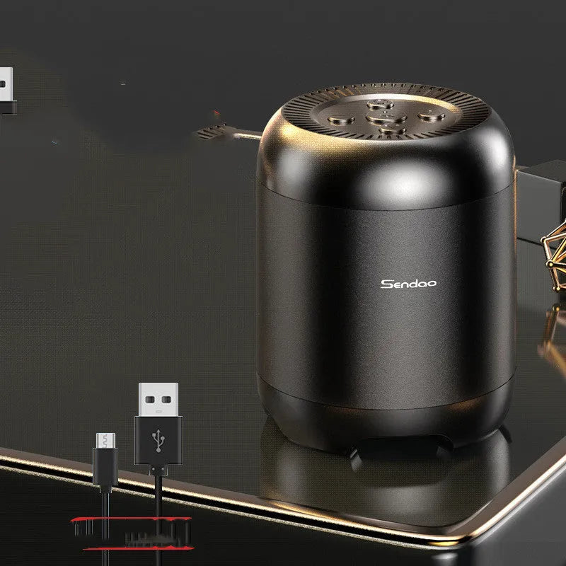 Compact black and white Bluetooth wireless speaker with super subwoofer showing USB port